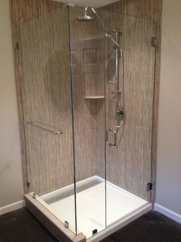 Framless Shower Door Installed On Acrylic Pan